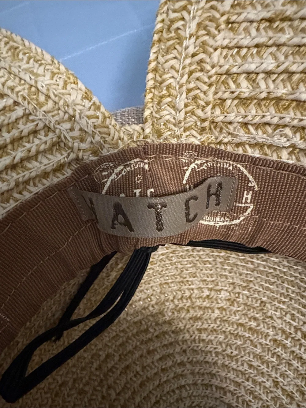 Women’s straw  sun hat with tan bow. Great for the beach.